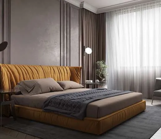 Designer bedroom with upholstered bed and textured walls