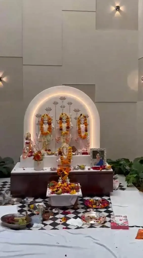 Arched, lit pooja room — Organic Tattva project