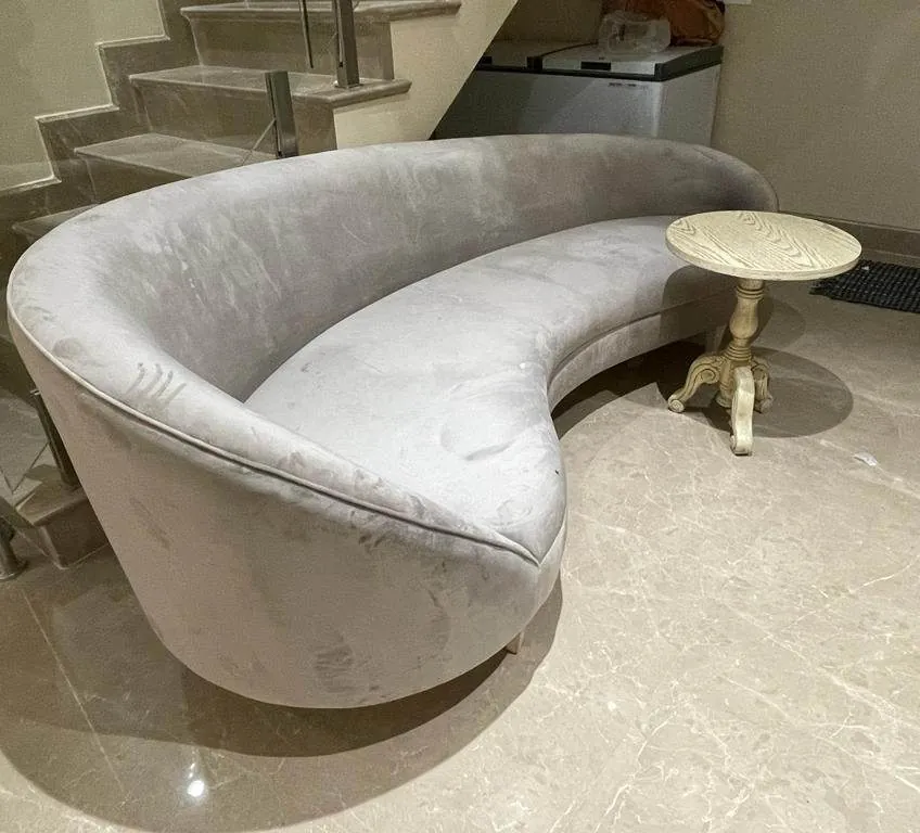 Grey velvet kidney-shaped curved sofa