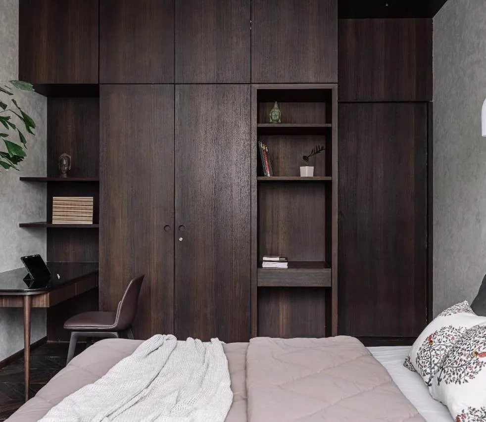 Walnut bedroom joinery with study desk and open shelving